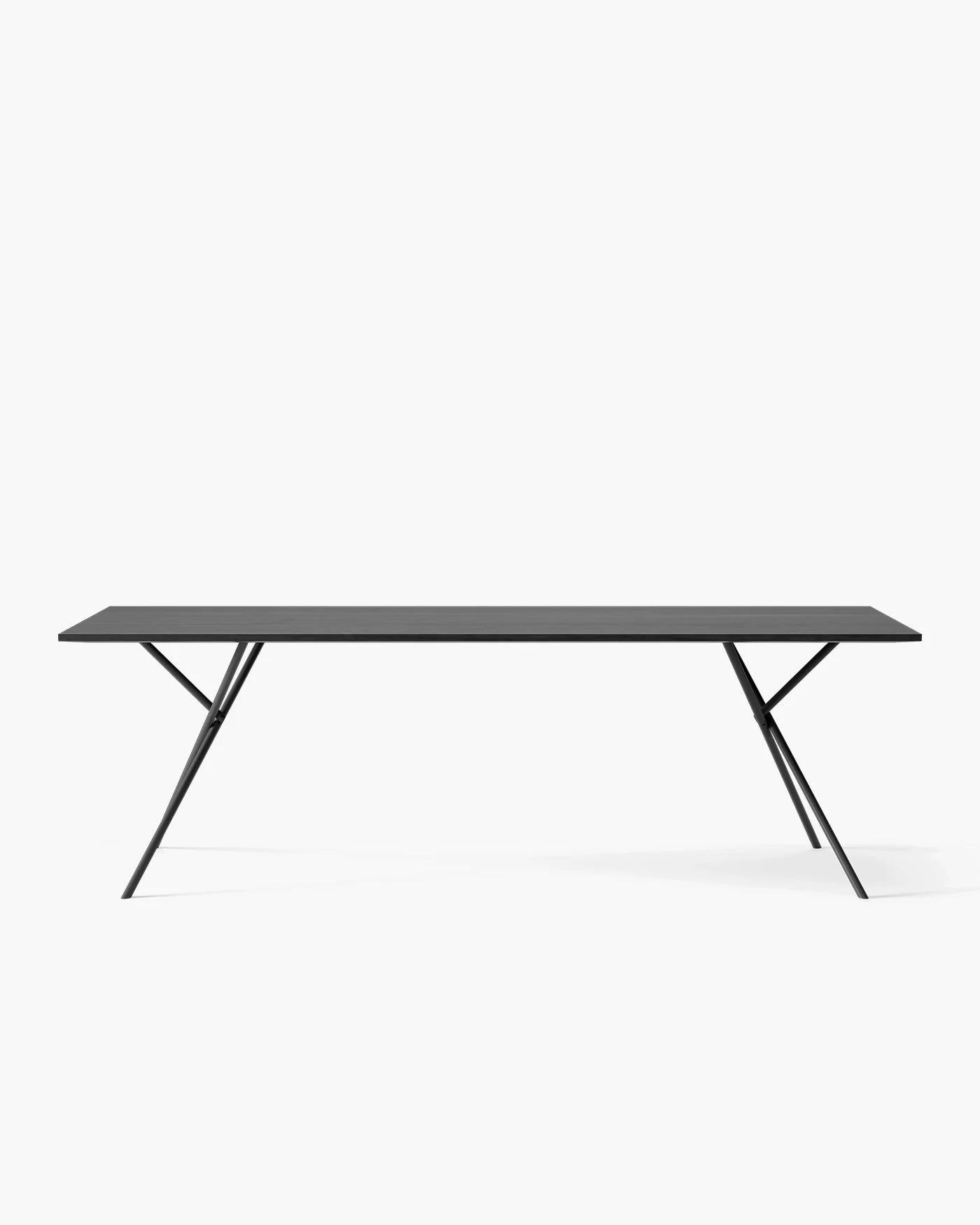 Melker dining table in sleek black oak design, featuring bold lines and a minimalist aesthetic for modern dining spaces.